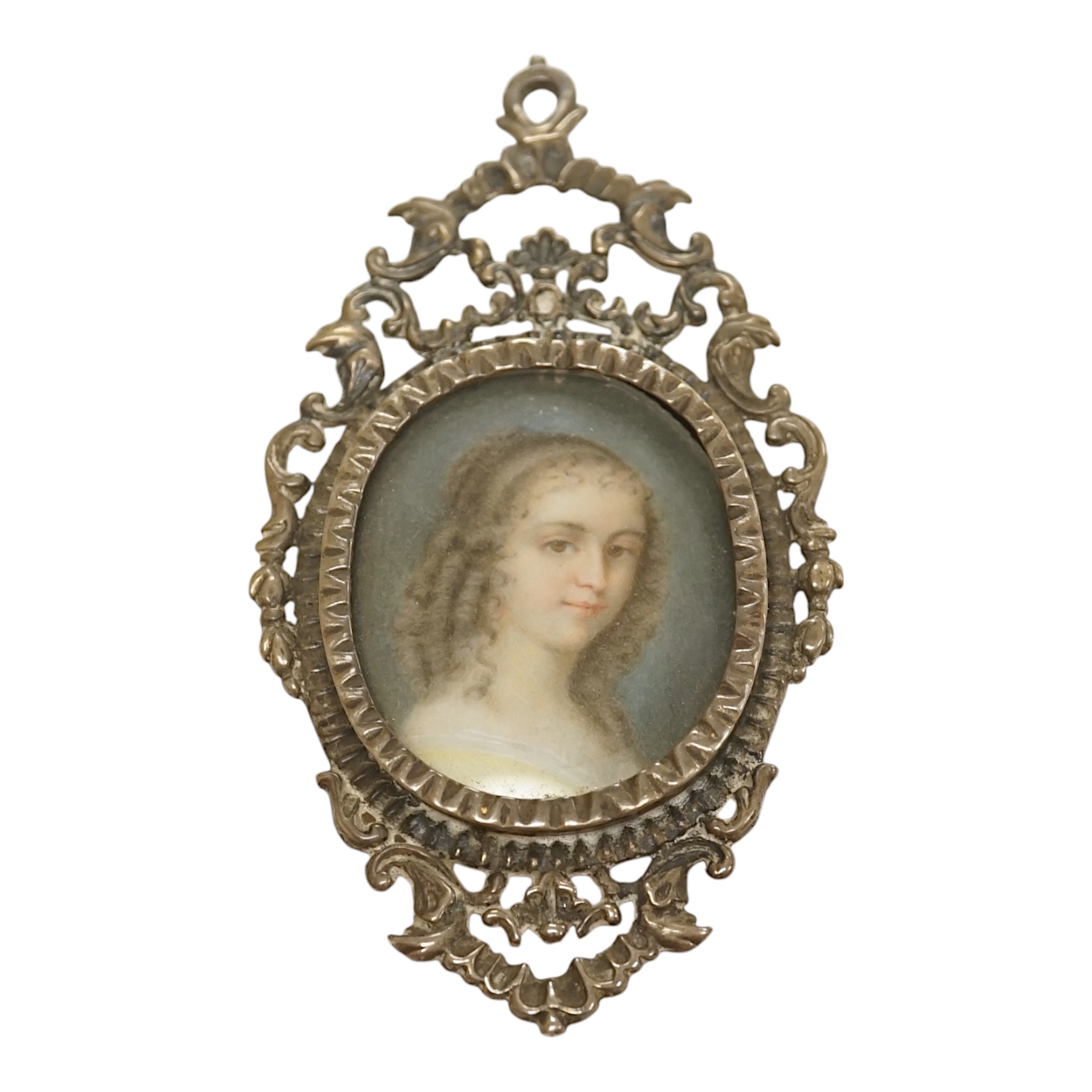 English School circa 1840, watercolour on ivory miniature portrait of a young lady with ringlets, size overall 10cm high, housed in an ornate silver frame. CITES Submission reference 8JBKVYPE. Condition - fair to good